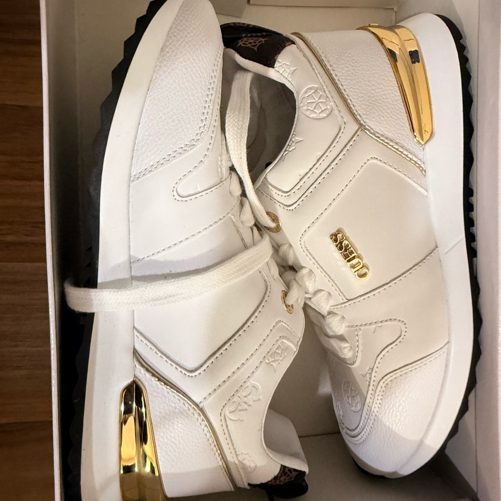 The new one. Not to wear .Guess women’s Sneakers in White with Gold Details